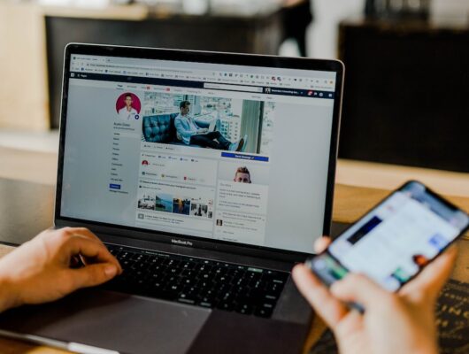 facebook page displayed on the laptop