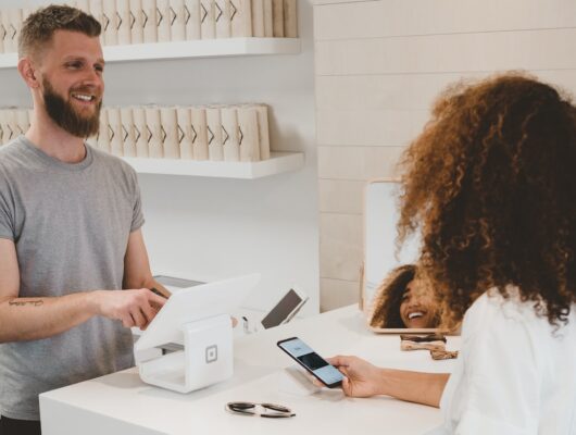 customer interacting with staff