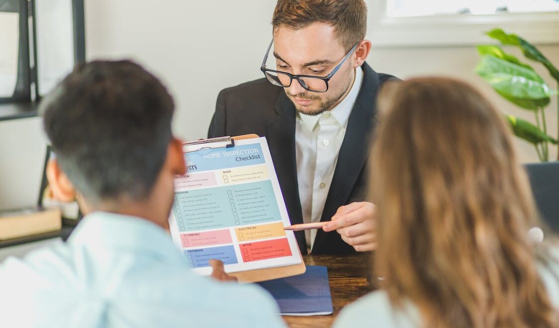 executive talking to clients